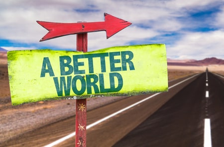 Road with arrow and sign saying "A better world"